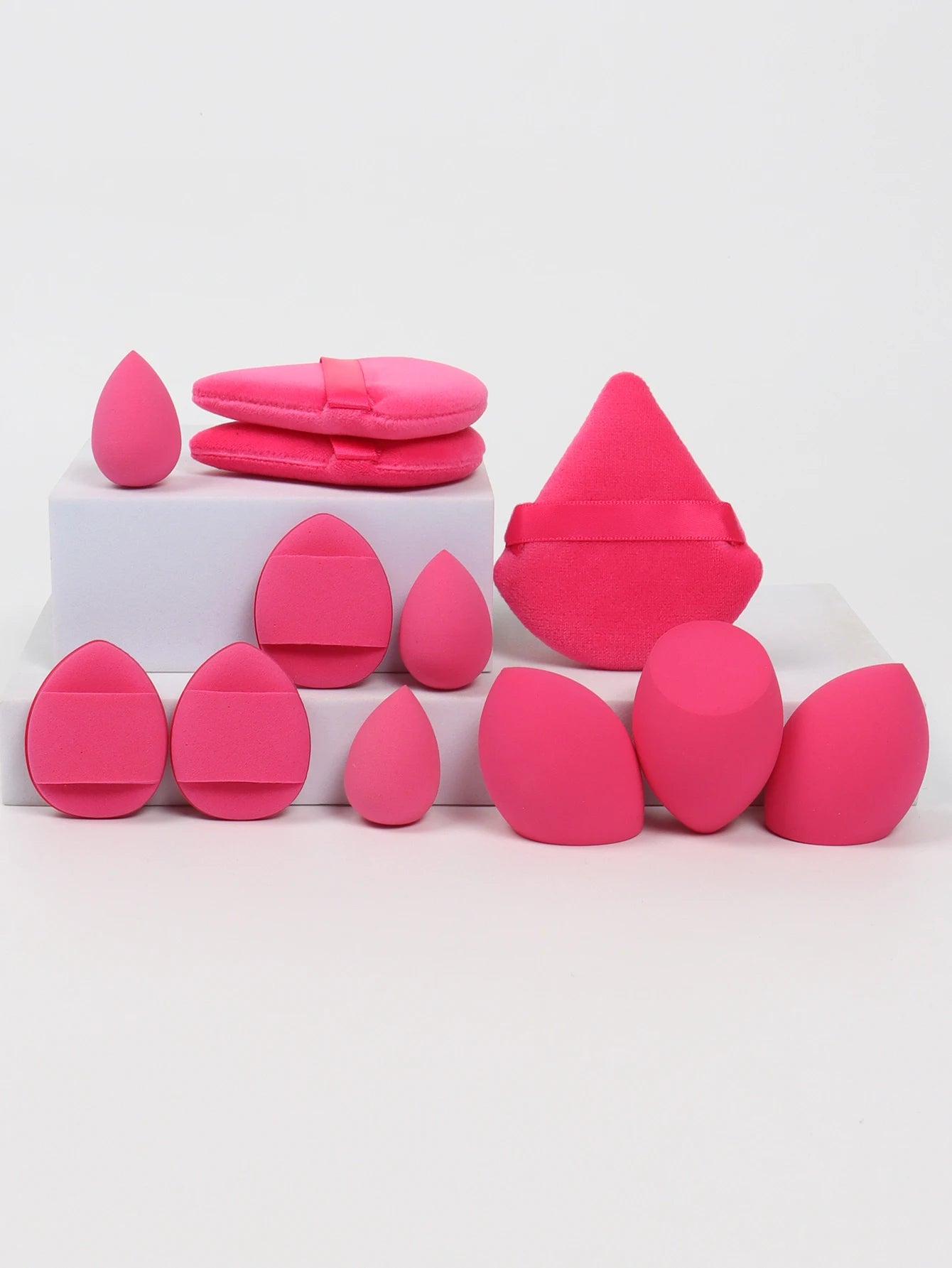 12-Piece All-Purpose Makeup Sponge Set, consisting of 3 Loose Powder Puffs, 3 Mini Air Cushion Puffs, 3 Beauty Eggs, and 3 Mini Beauty Sponges.