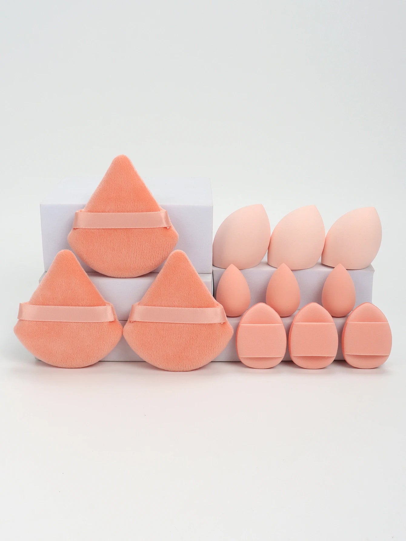 12-Piece All-Purpose Makeup Sponge Set, consisting of 3 Loose Powder Puffs, 3 Mini Air Cushion Puffs, 3 Beauty Eggs, and 3 Mini Beauty Sponges.