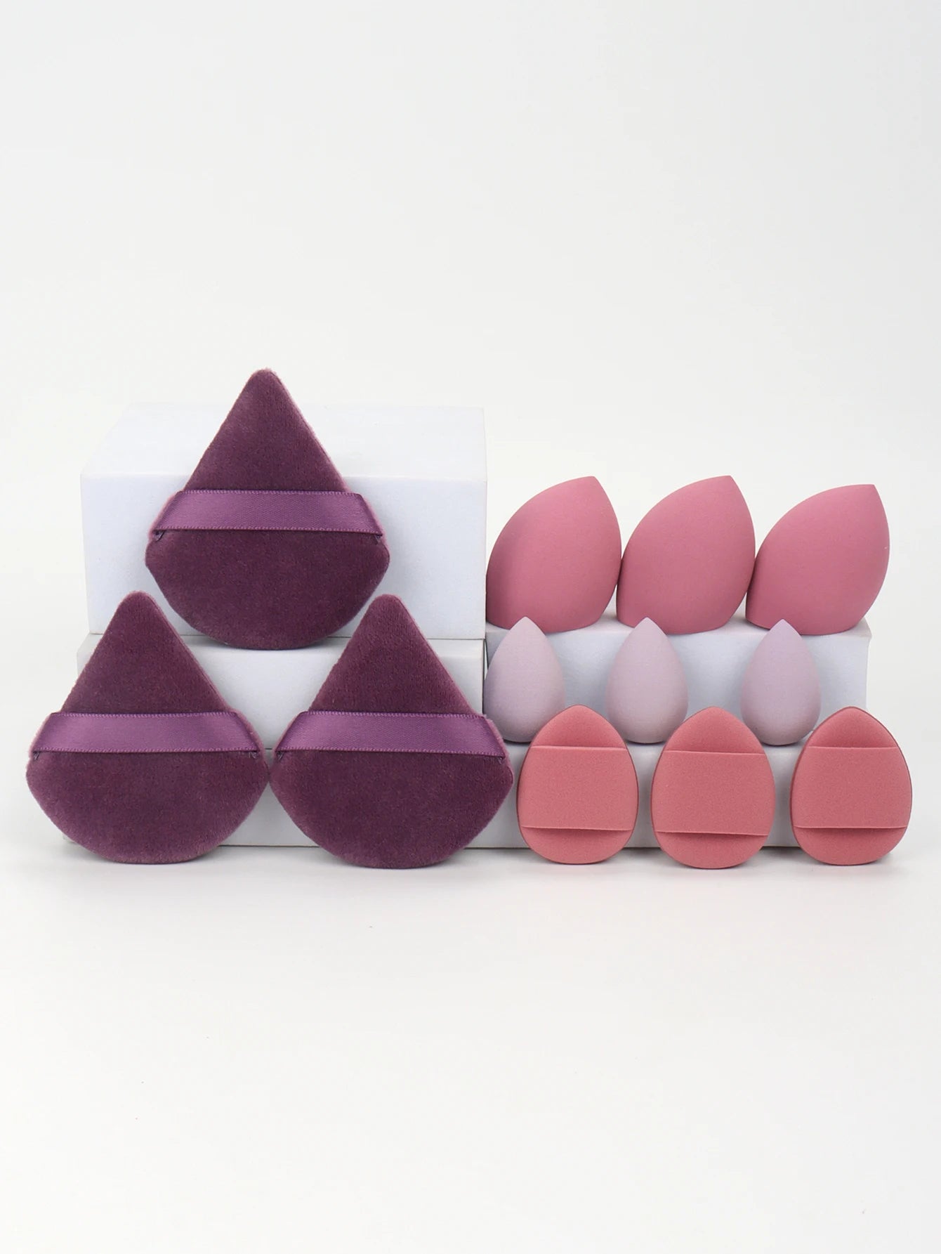 12-Piece All-Purpose Makeup Sponge Set, consisting of 3 Loose Powder Puffs, 3 Mini Air Cushion Puffs, 3 Beauty Eggs, and 3 Mini Beauty Sponges.