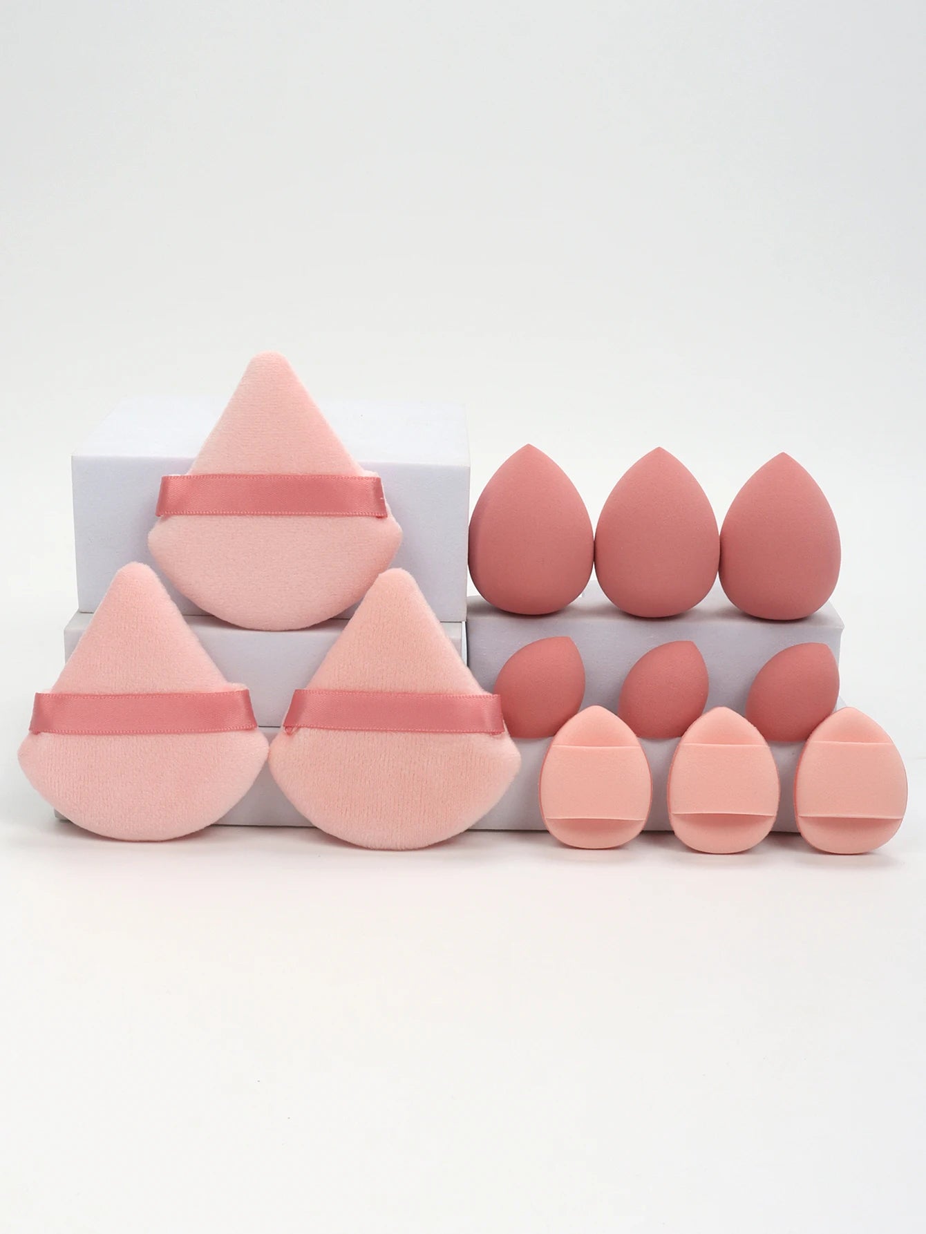 12-Piece All-Purpose Makeup Sponge Set, consisting of 3 Loose Powder Puffs, 3 Mini Air Cushion Puffs, 3 Beauty Eggs, and 3 Mini Beauty Sponges.