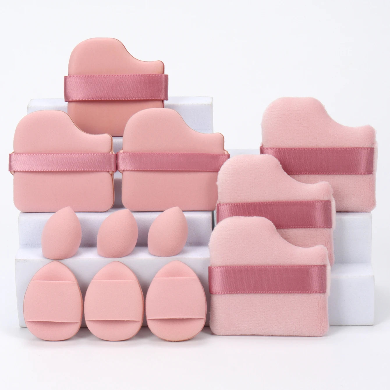 12-Piece All-Purpose Makeup Sponge Set, consisting of 3 Loose Powder Puffs, 3 Mini Air Cushion Puffs, 3 Beauty Eggs, and 3 Mini Beauty Sponges.