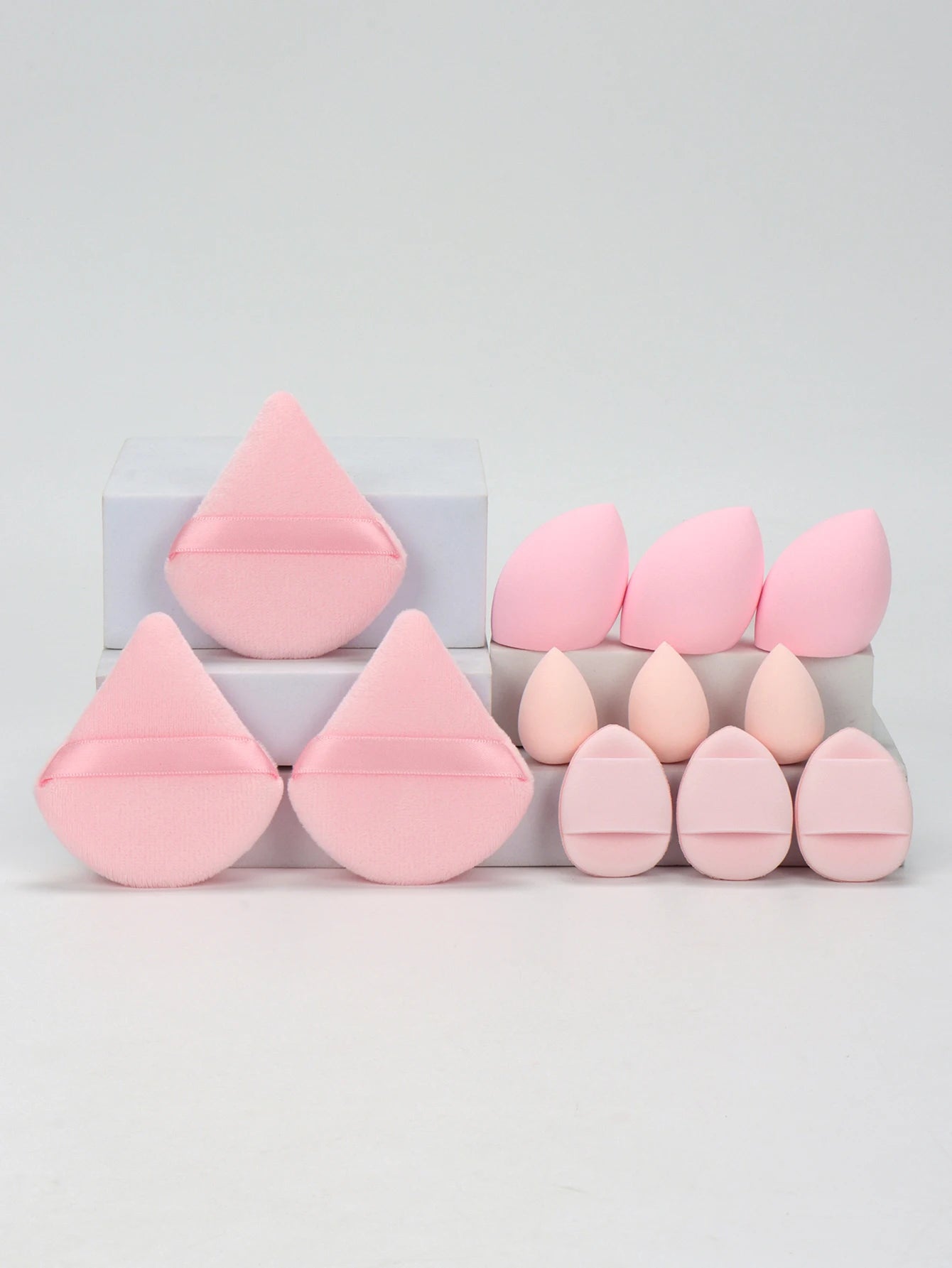 12-Piece All-Purpose Makeup Sponge Set, consisting of 3 Loose Powder Puffs, 3 Mini Air Cushion Puffs, 3 Beauty Eggs, and 3 Mini Beauty Sponges.