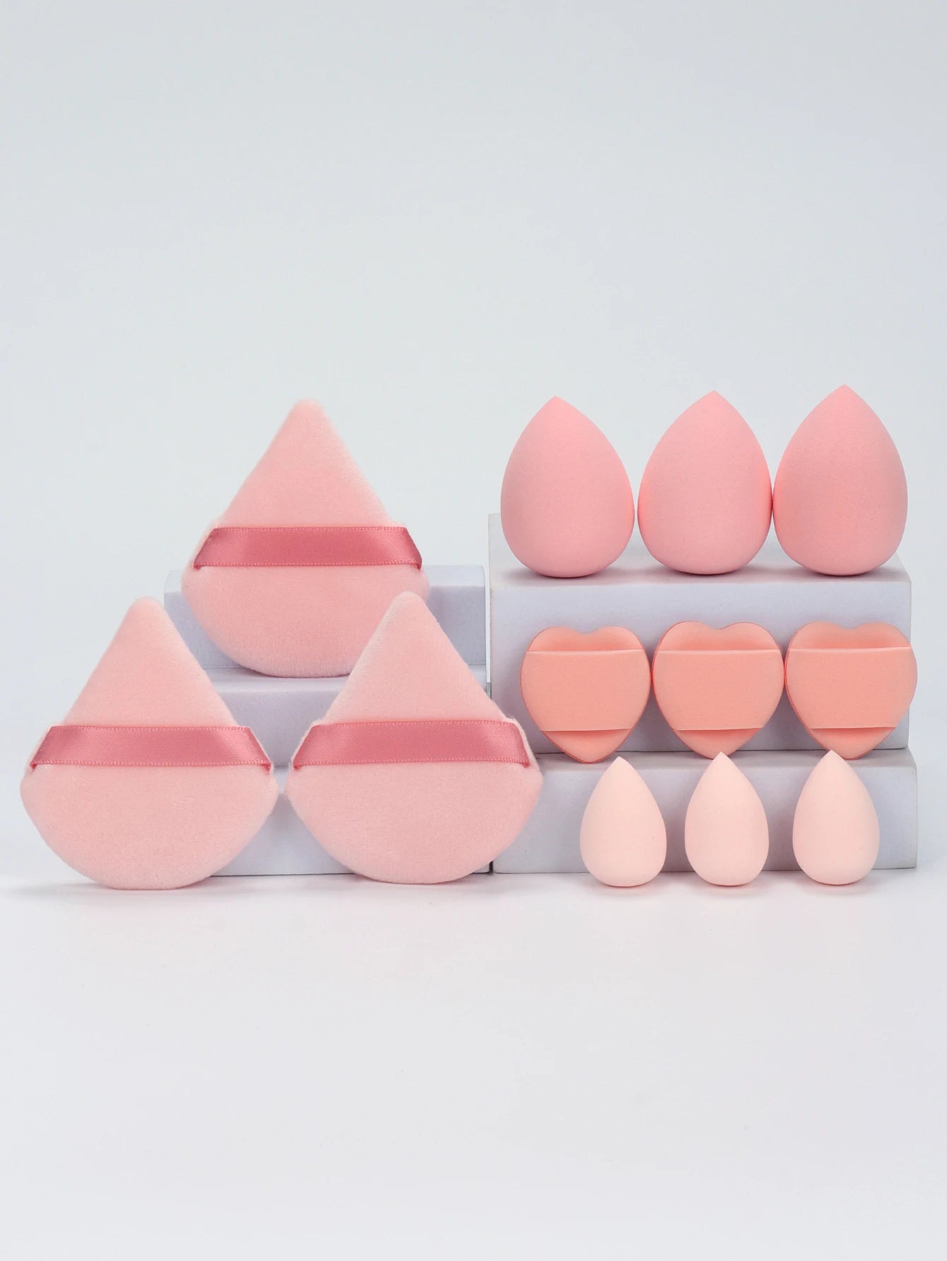 12-Piece All-Purpose Makeup Sponge Set, consisting of 3 Loose Powder Puffs, 3 Mini Air Cushion Puffs, 3 Beauty Eggs, and 3 Mini Beauty Sponges.