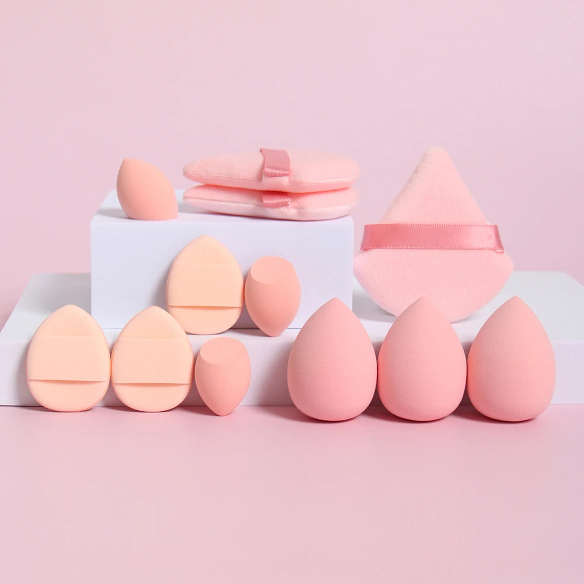 12-Piece All-Purpose Makeup Sponge Set, consisting of 3 Loose Powder Puffs, 3 Mini Air Cushion Puffs, 3 Beauty Eggs, and 3 Mini Beauty Sponges.