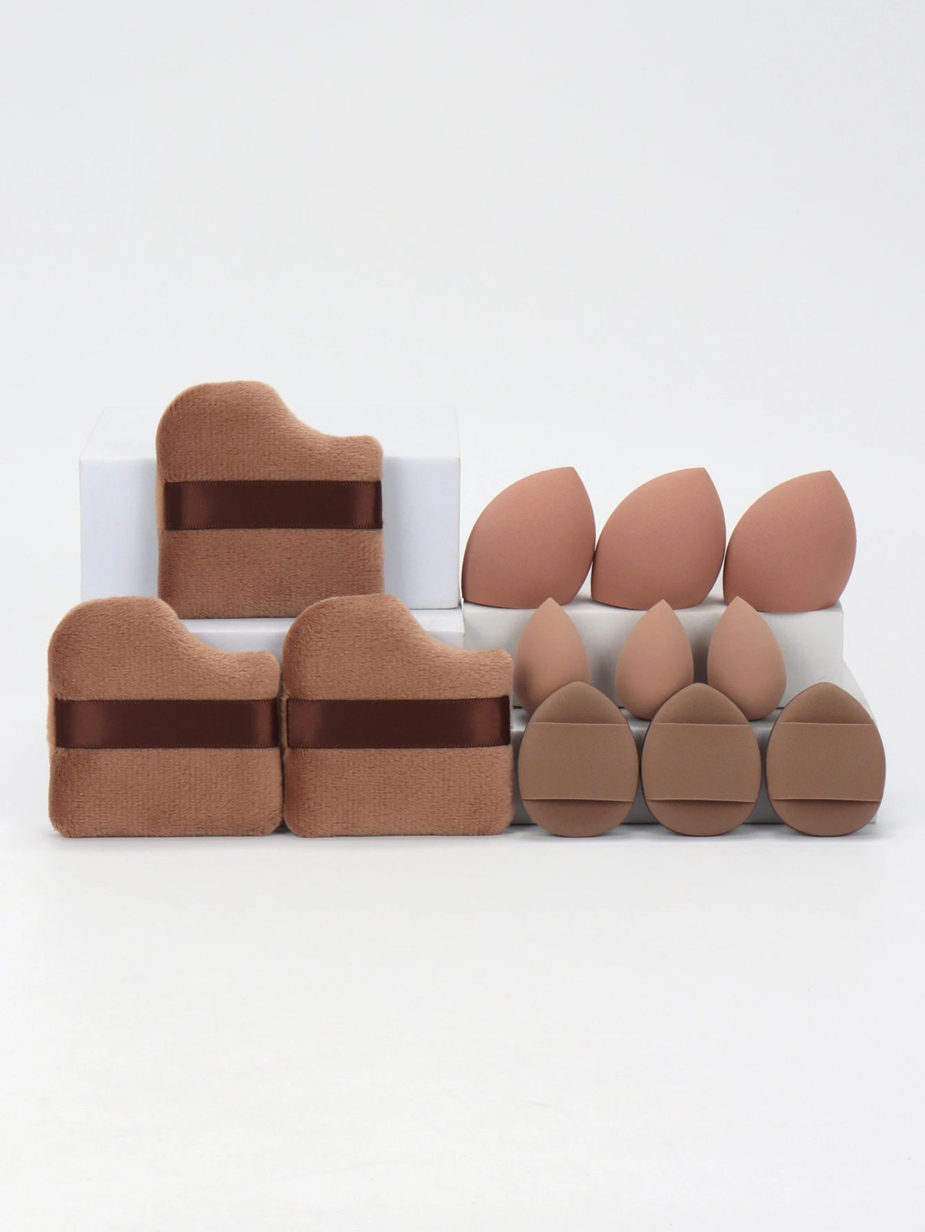 12-Piece All-Purpose Makeup Sponge Set, consisting of 3 Loose Powder Puffs, 3 Mini Air Cushion Puffs, 3 Beauty Eggs, and 3 Mini Beauty Sponges.