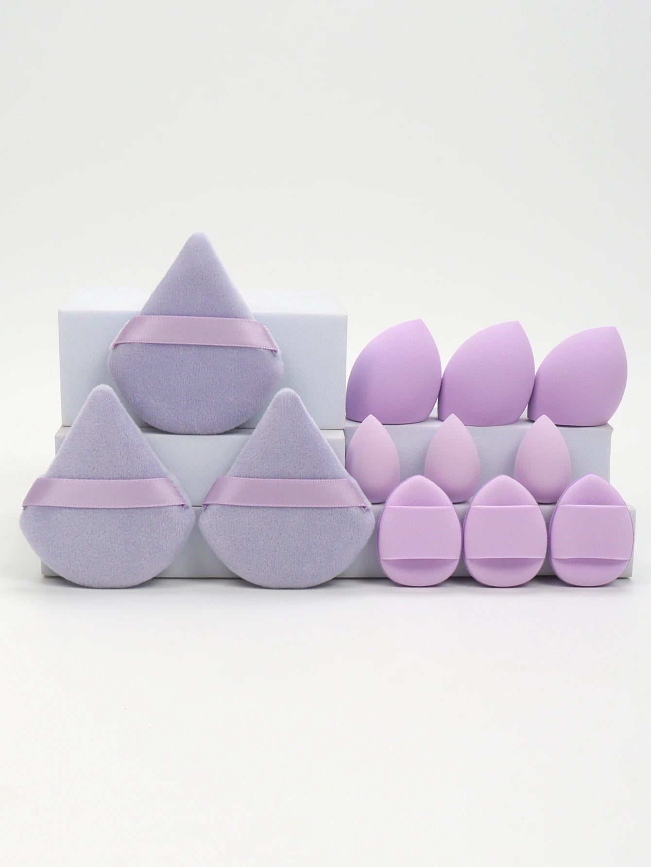 12-Piece All-Purpose Makeup Sponge Set, consisting of 3 Loose Powder Puffs, 3 Mini Air Cushion Puffs, 3 Beauty Eggs, and 3 Mini Beauty Sponges.