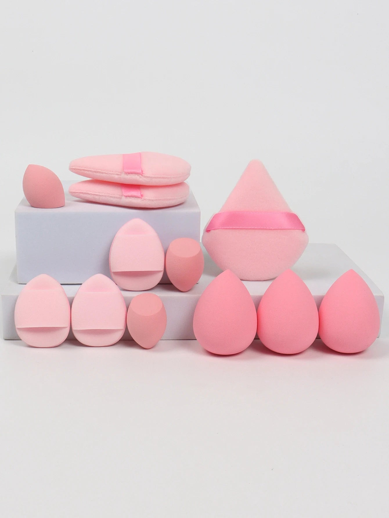 12-Piece All-Purpose Makeup Sponge Set, consisting of 3 Loose Powder Puffs, 3 Mini Air Cushion Puffs, 3 Beauty Eggs, and 3 Mini Beauty Sponges.
